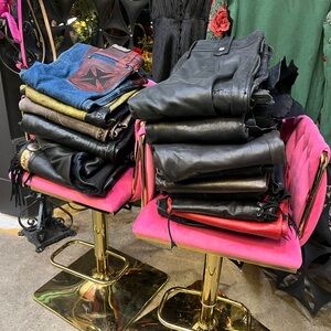 Stack of Leather Pants and Jackets
